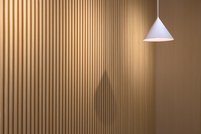 Acoustic desk divider in an office